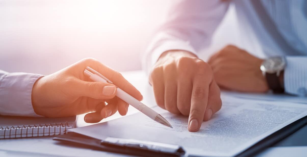 business people negotiating a contract.