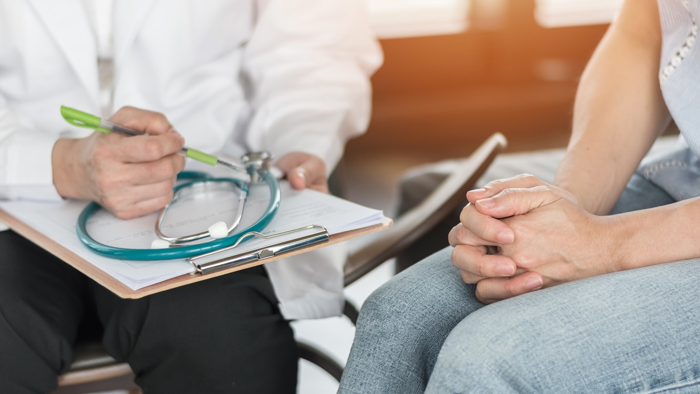 doctor or psychiatrist consulting and diagnostic examining stressful woman patient on obstetric gynecological female illness, or mental health in medical clinic or hospital healthcare service center