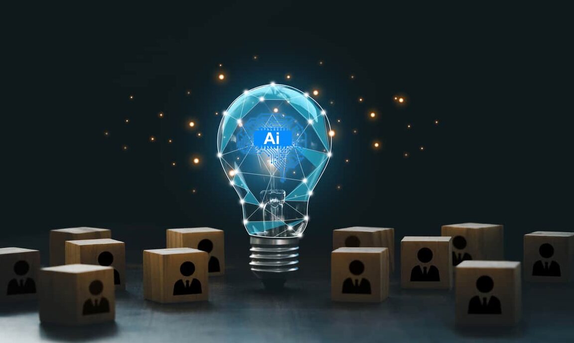 artificial intelligence innovation. ai adoption and working. ai with a digital brain in a lightbulb with human icons in wooden blocks for ai vs human competition. manage personnel in the organization