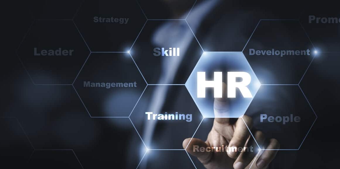 businessman touching to virtual screen with infographic and hr wording , human development and recruitment concept.